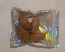 Load image into Gallery viewer, Fresh Bitter Kola Nut. A Pack contains 4 Bitter Kola
